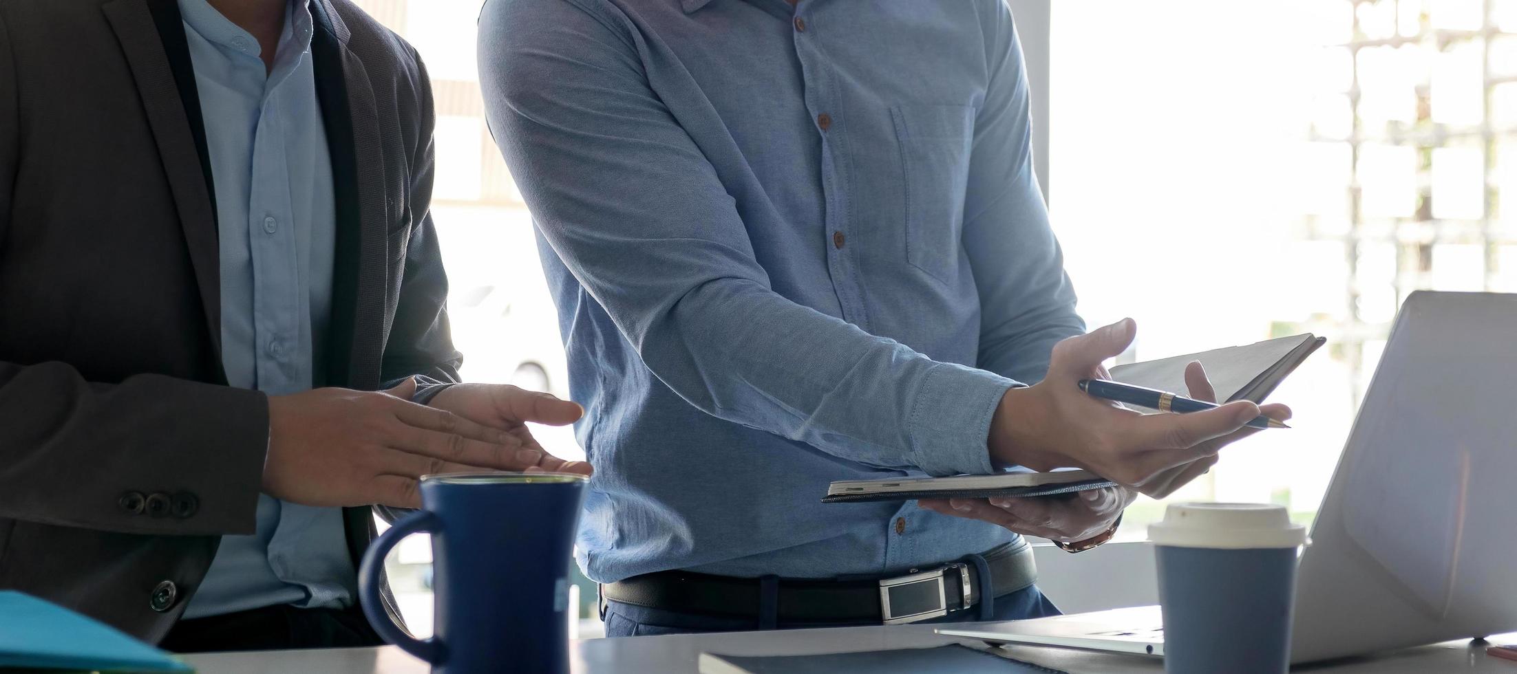 People working in the office, close-up photo