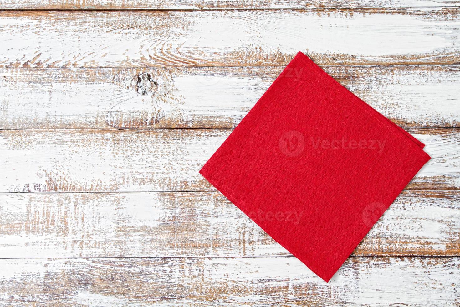 cloth red napkin on wooden background, mock up,copy space photo