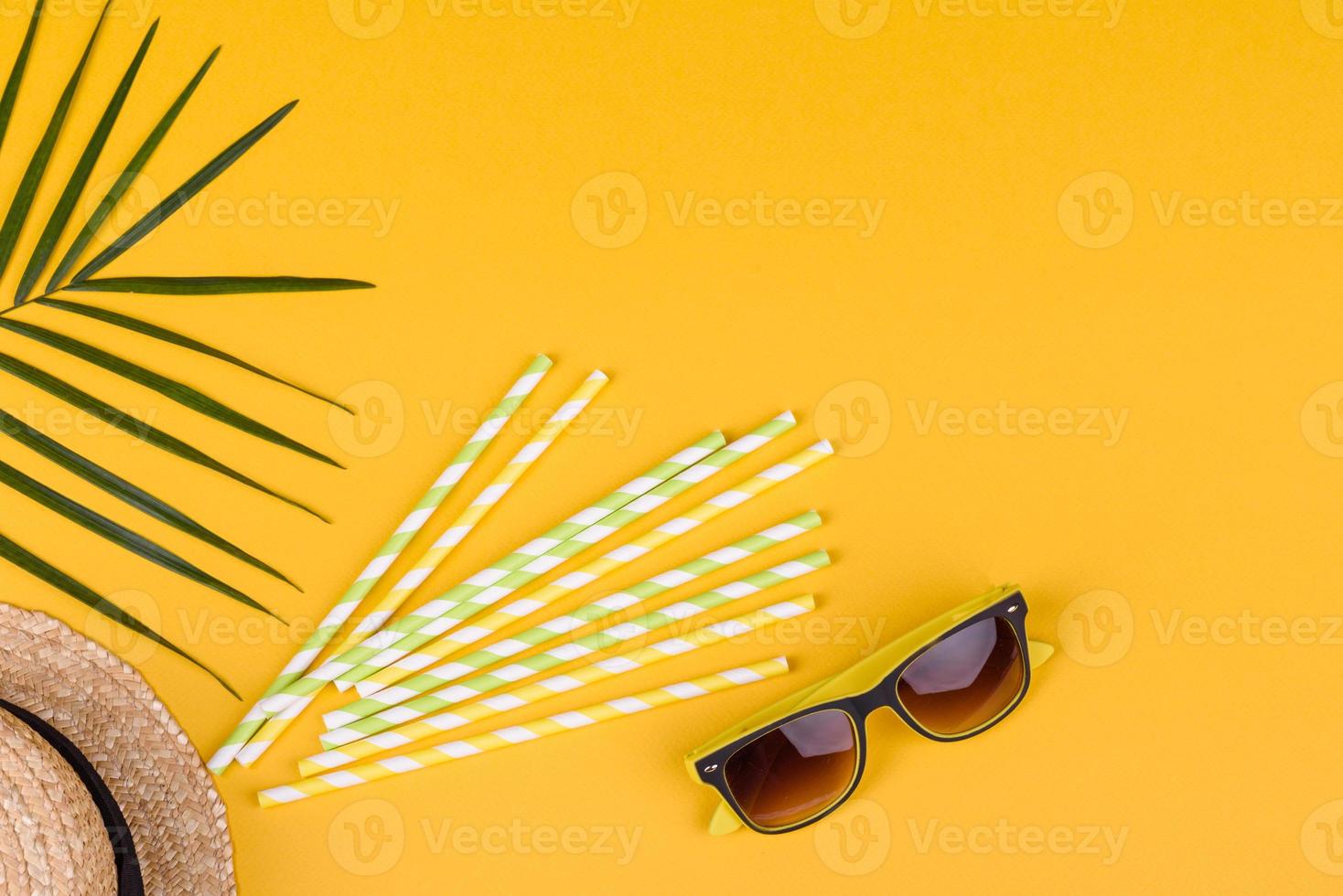 Beach accessories with shells and sea stars on a colored background photo