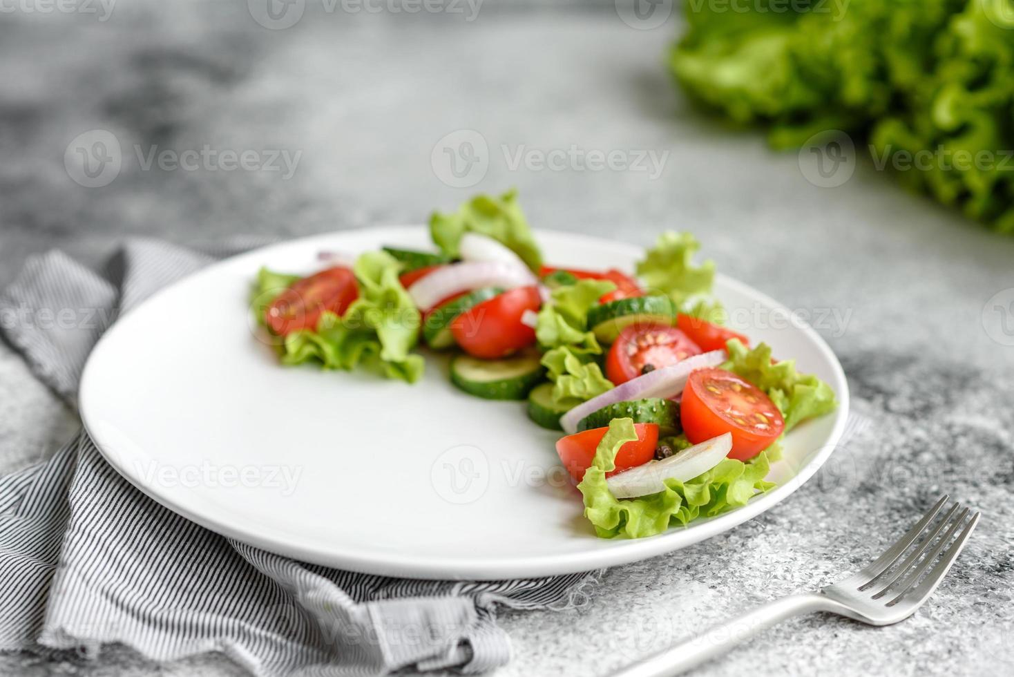 Fresh delicious salad with vegetables photo