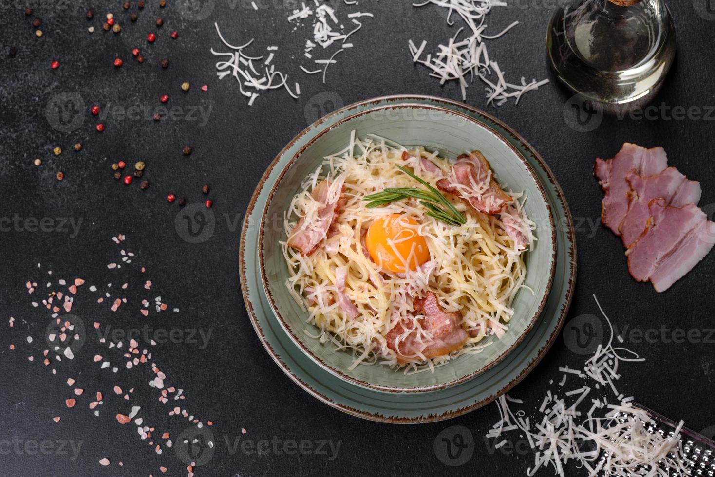 Pasta Carbonara. Spaghetti with bacon, egg, parsley and Parmesan cheese photo