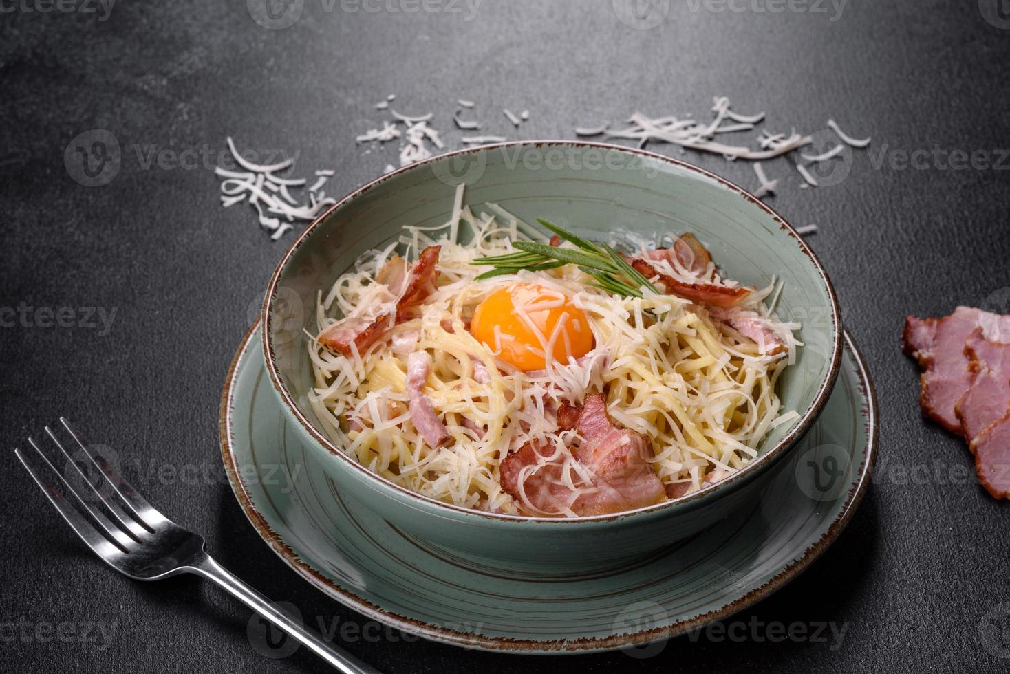 Pasta Carbonara. Spaghetti with bacon, egg, parsley and Parmesan cheese photo