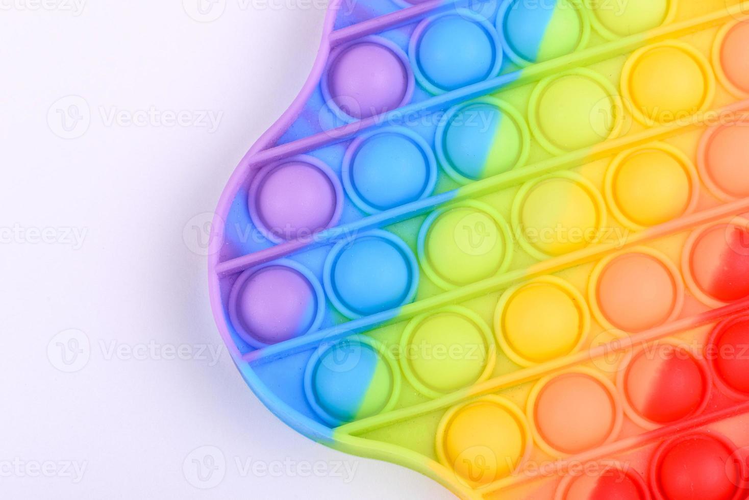 juguete para niños de colores brillantes hecho de silicona diseñado para aliviar el estrés foto