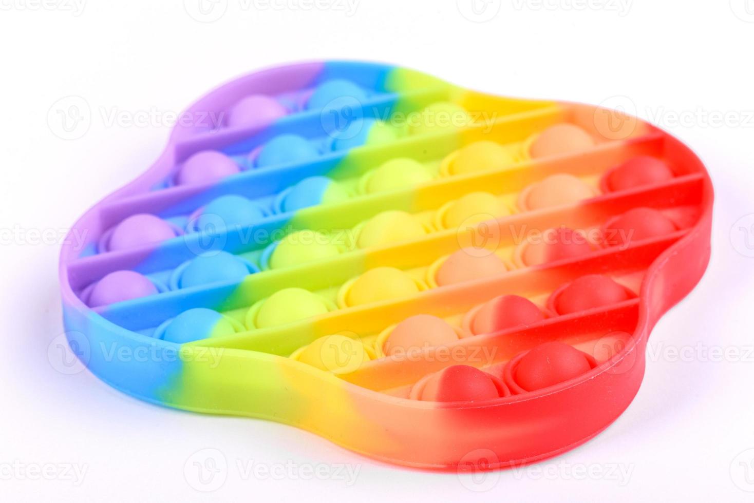 Bright colorful children's toy made of silicone designed to relieve stress photo