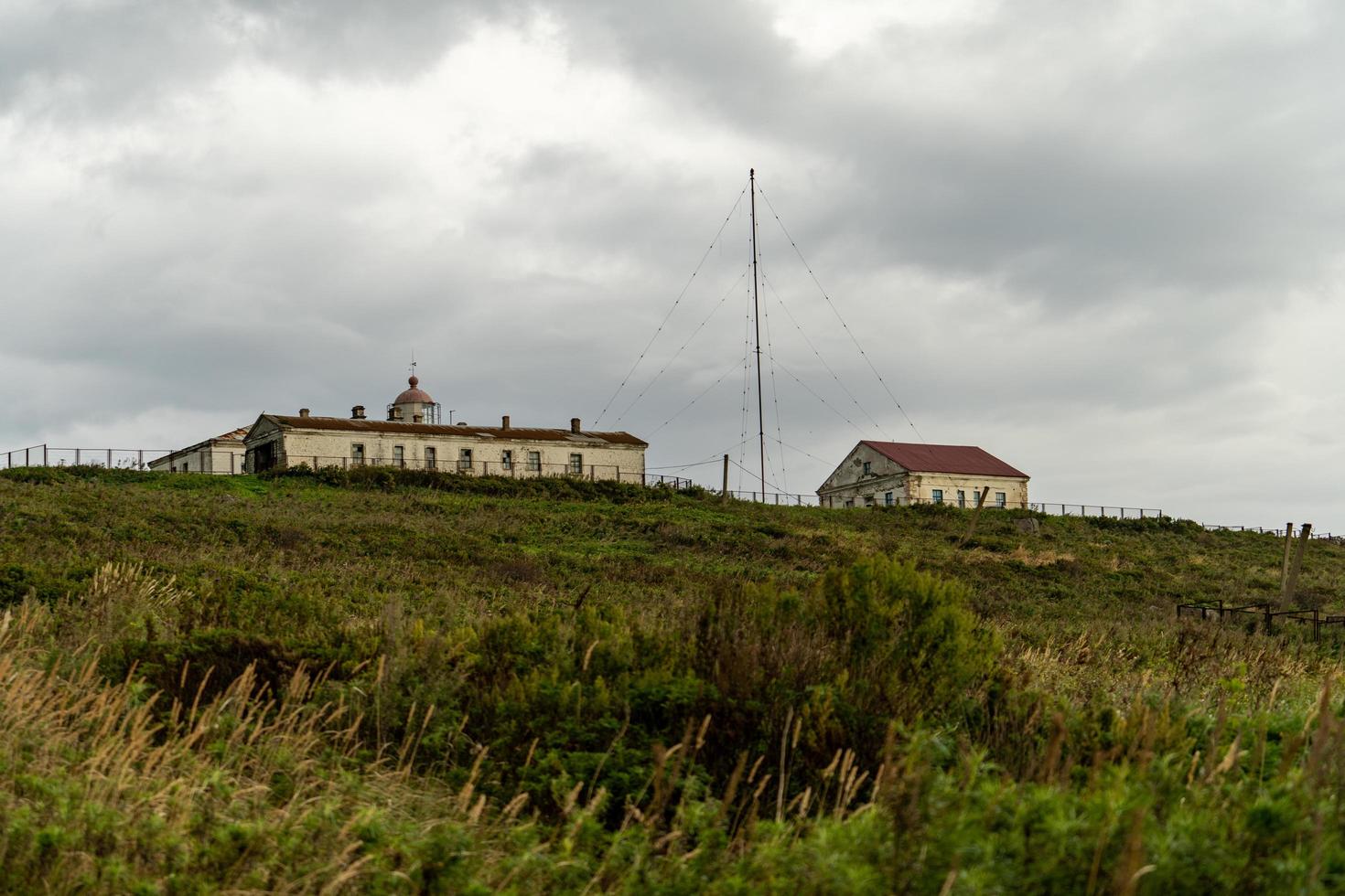 Landscape with old abandoned houses. photo