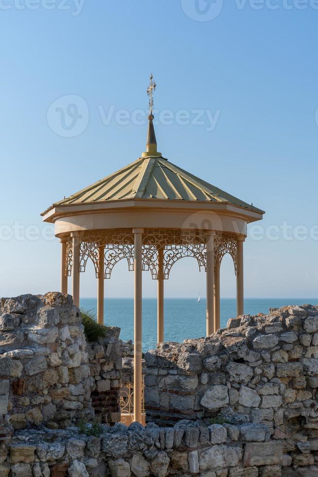 Yellow gazebo among the ruins of Chersonesos photo