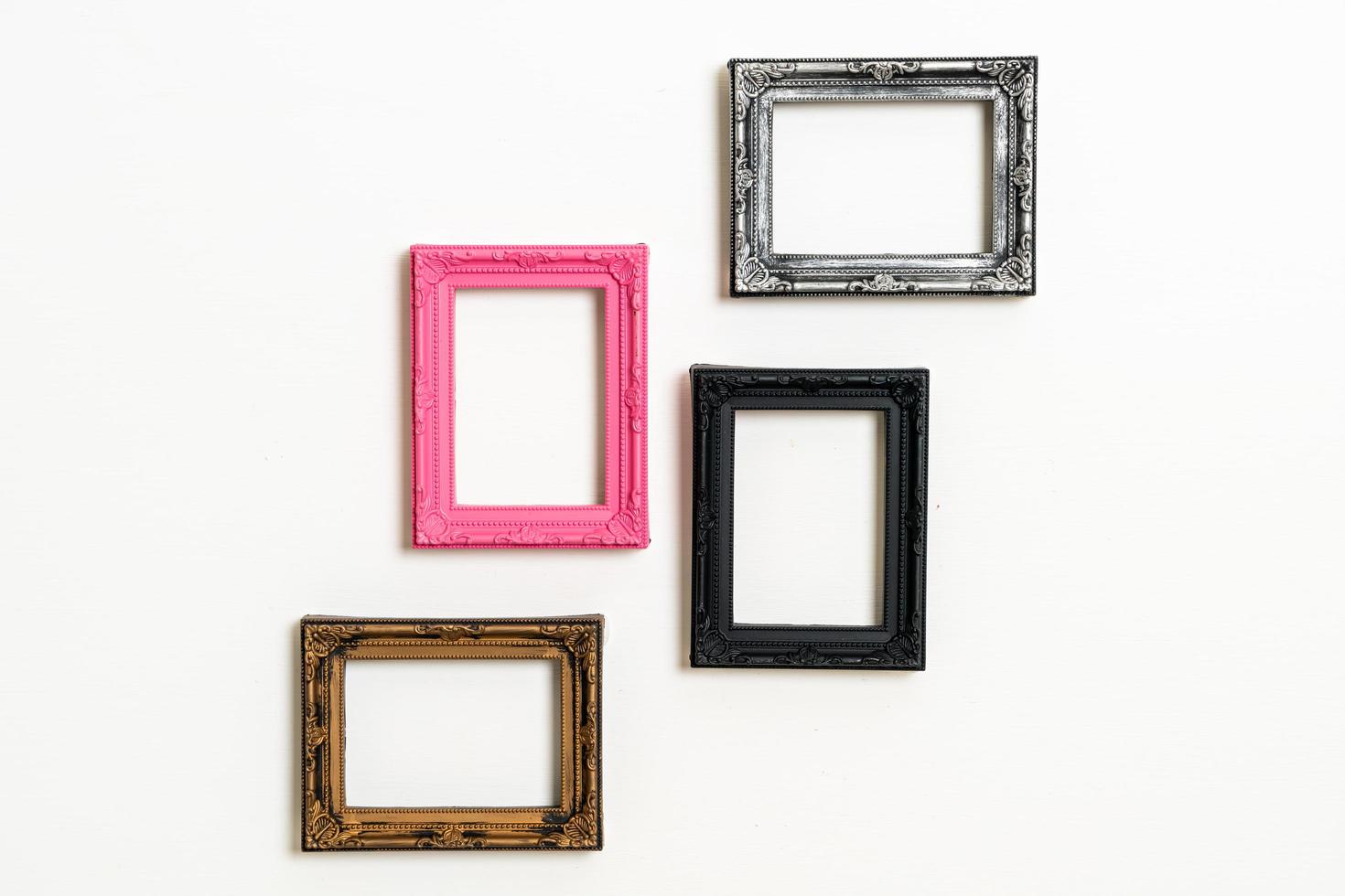 Empty picture frame on white wall background with copy space photo