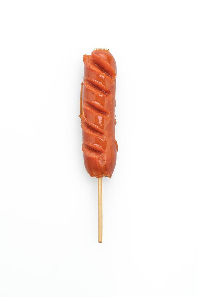 Fried sausage skewer isolated on white background photo