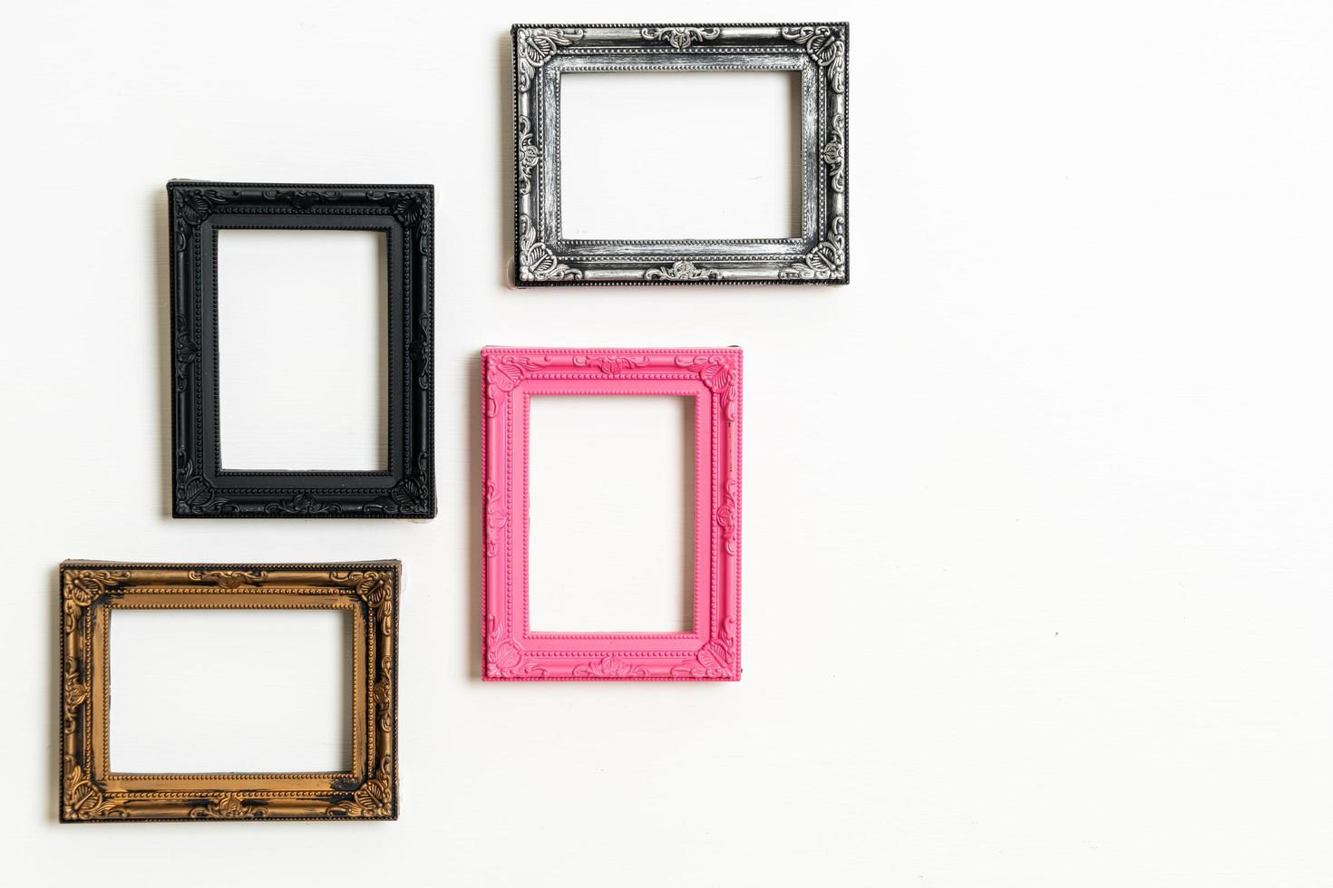 Empty picture frame on white wall background with copy space photo