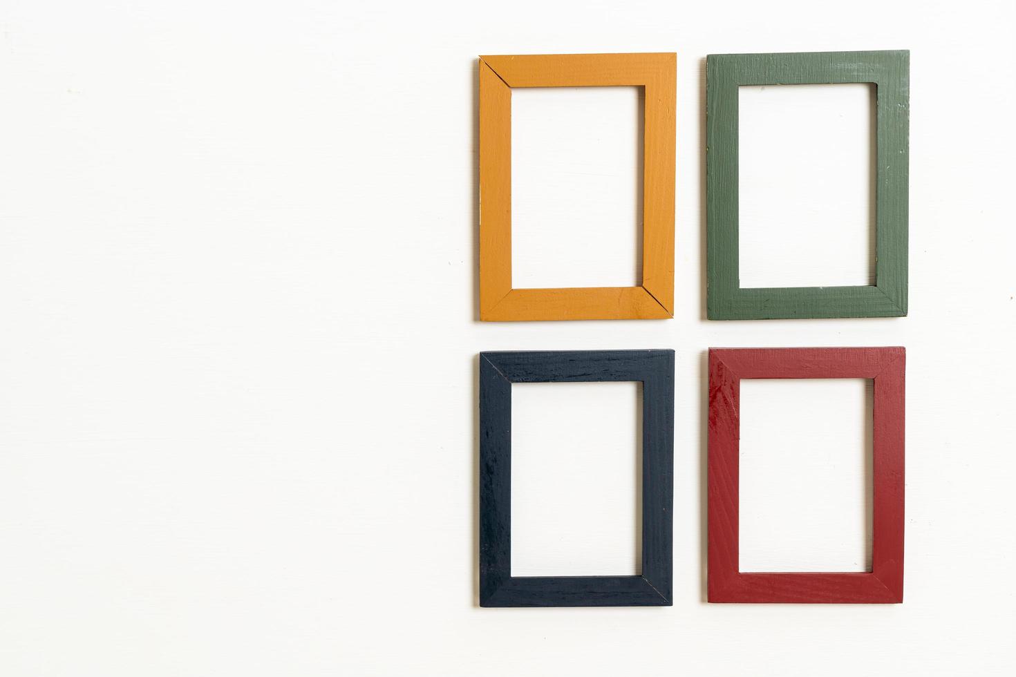 Empty picture frame on white wall background with copy space photo