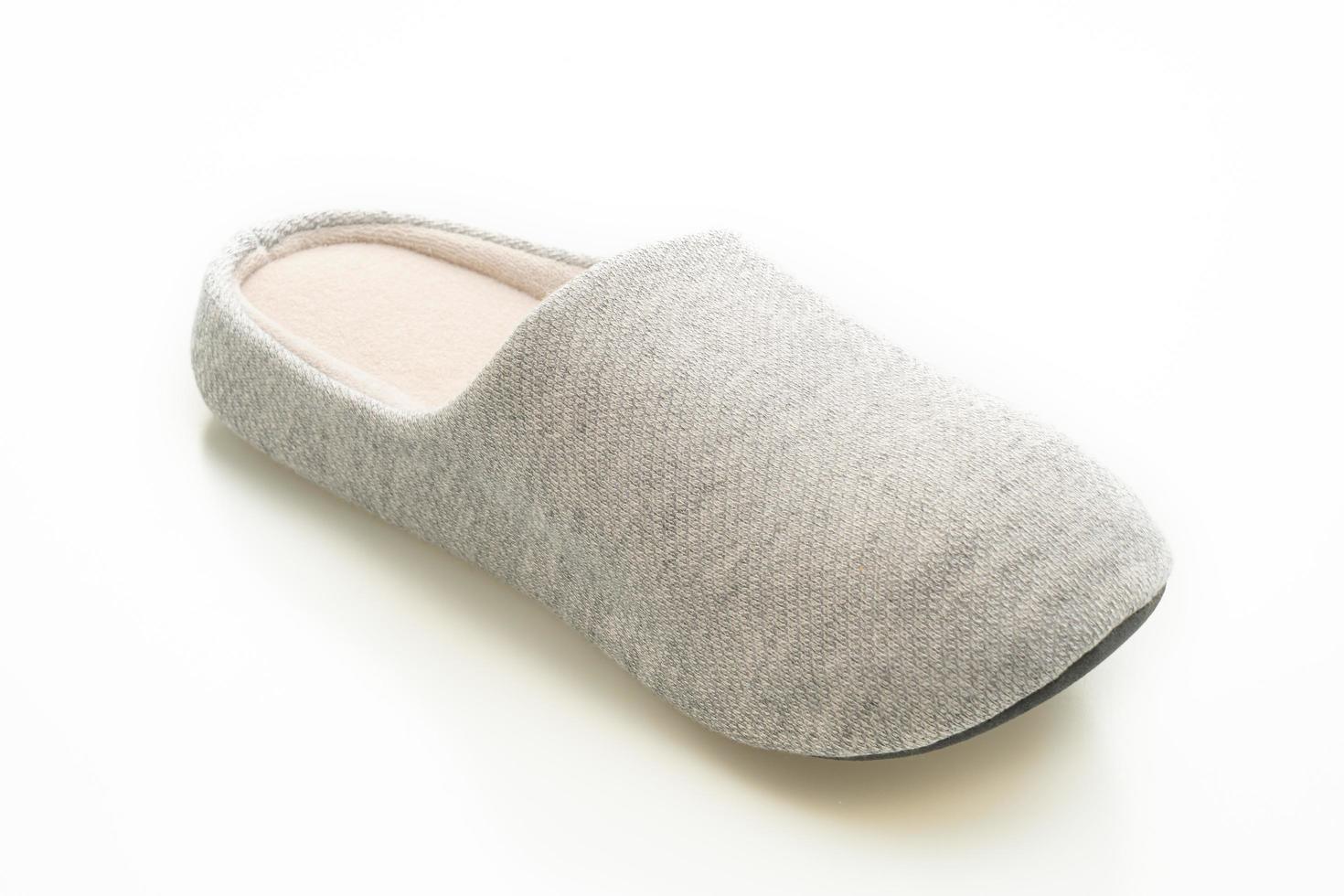 Grey slipper isolated on white background photo