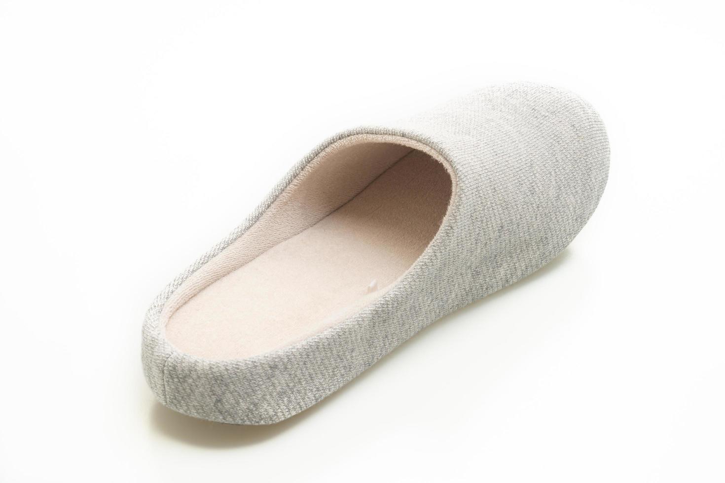 Grey slipper isolated on white background photo