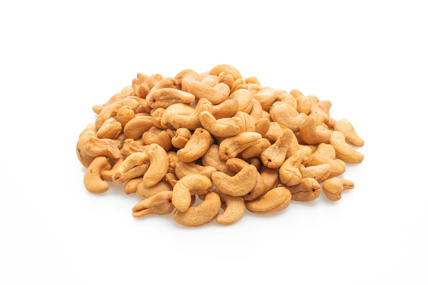 Cashew nuts on white background photo