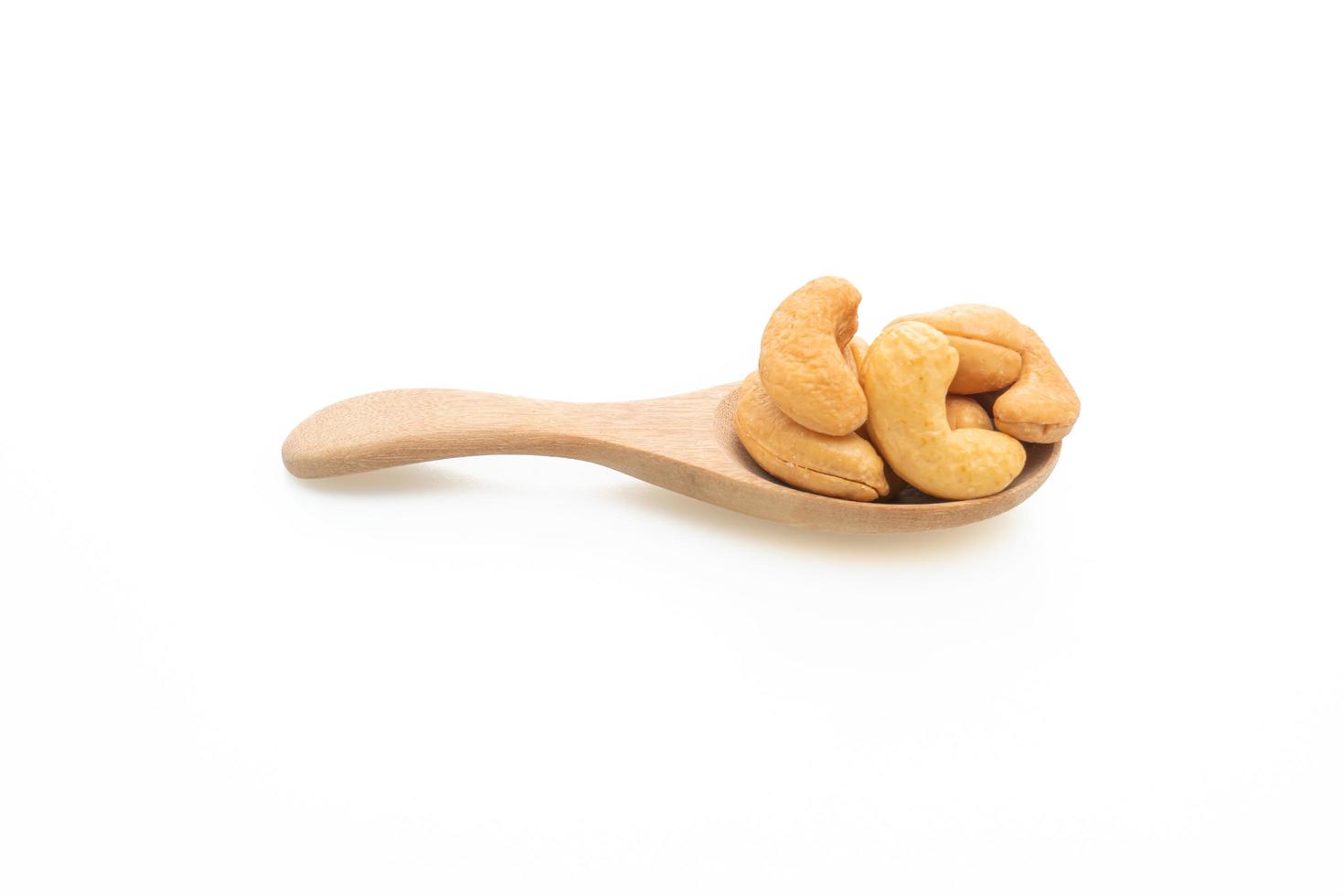 Cashew nuts on white background photo
