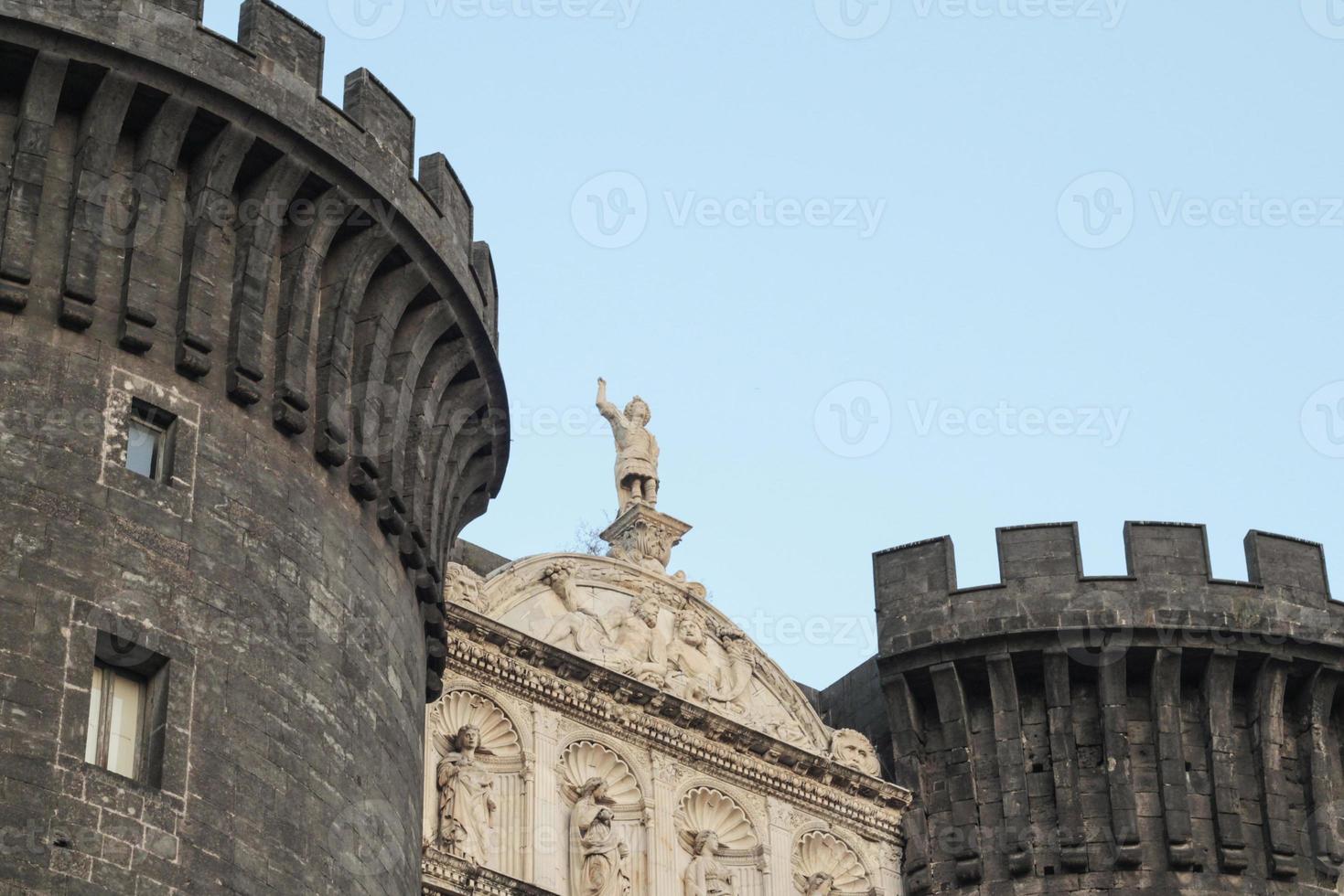 The medieval castle of Maschio Angioino in Naples photo