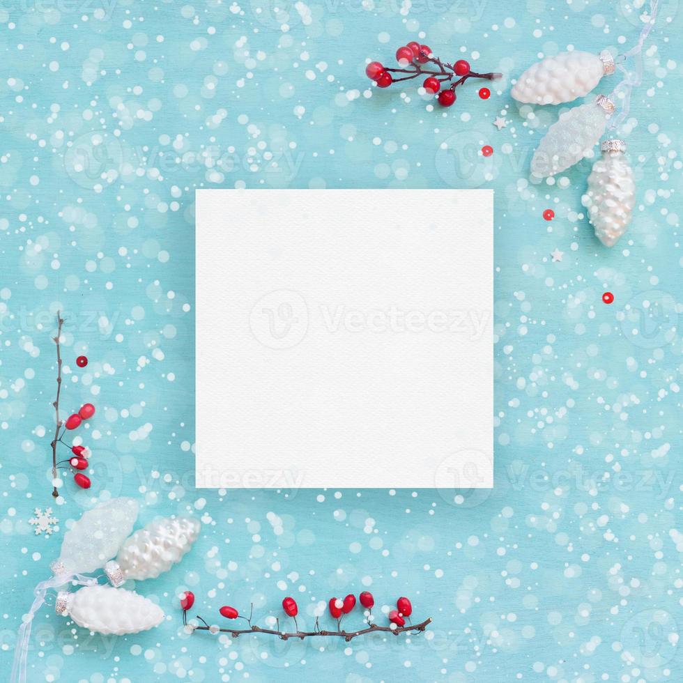 Christmas card or banner White pine cones and red berries photo