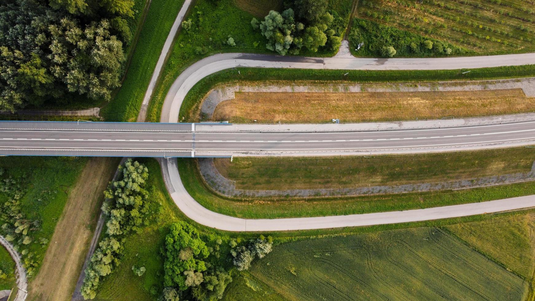 Aerial view of local road during summer day photo