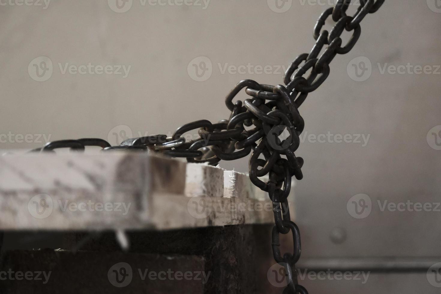 Old rusty and weathered iron chain photo