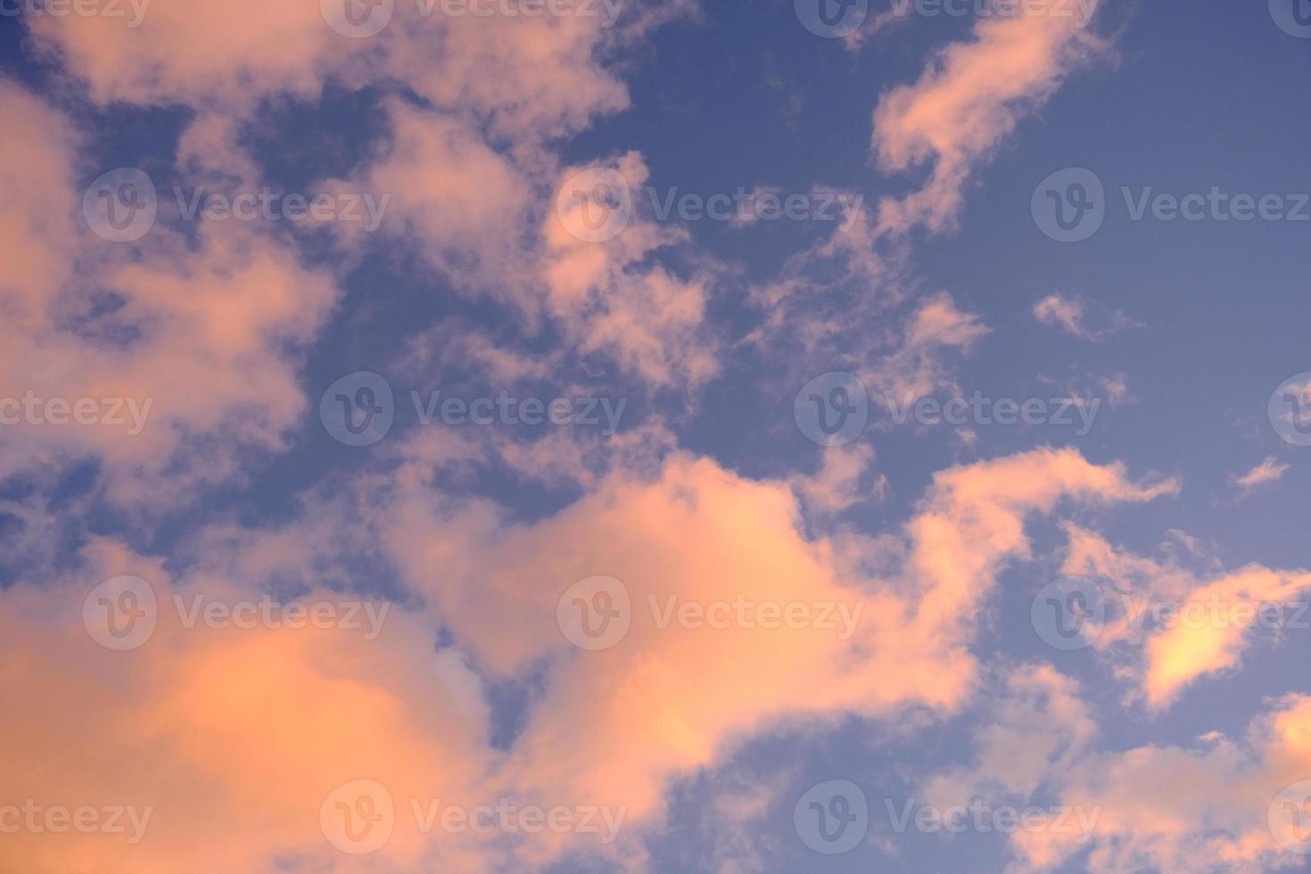 Blue sky with dreamy clouds photo