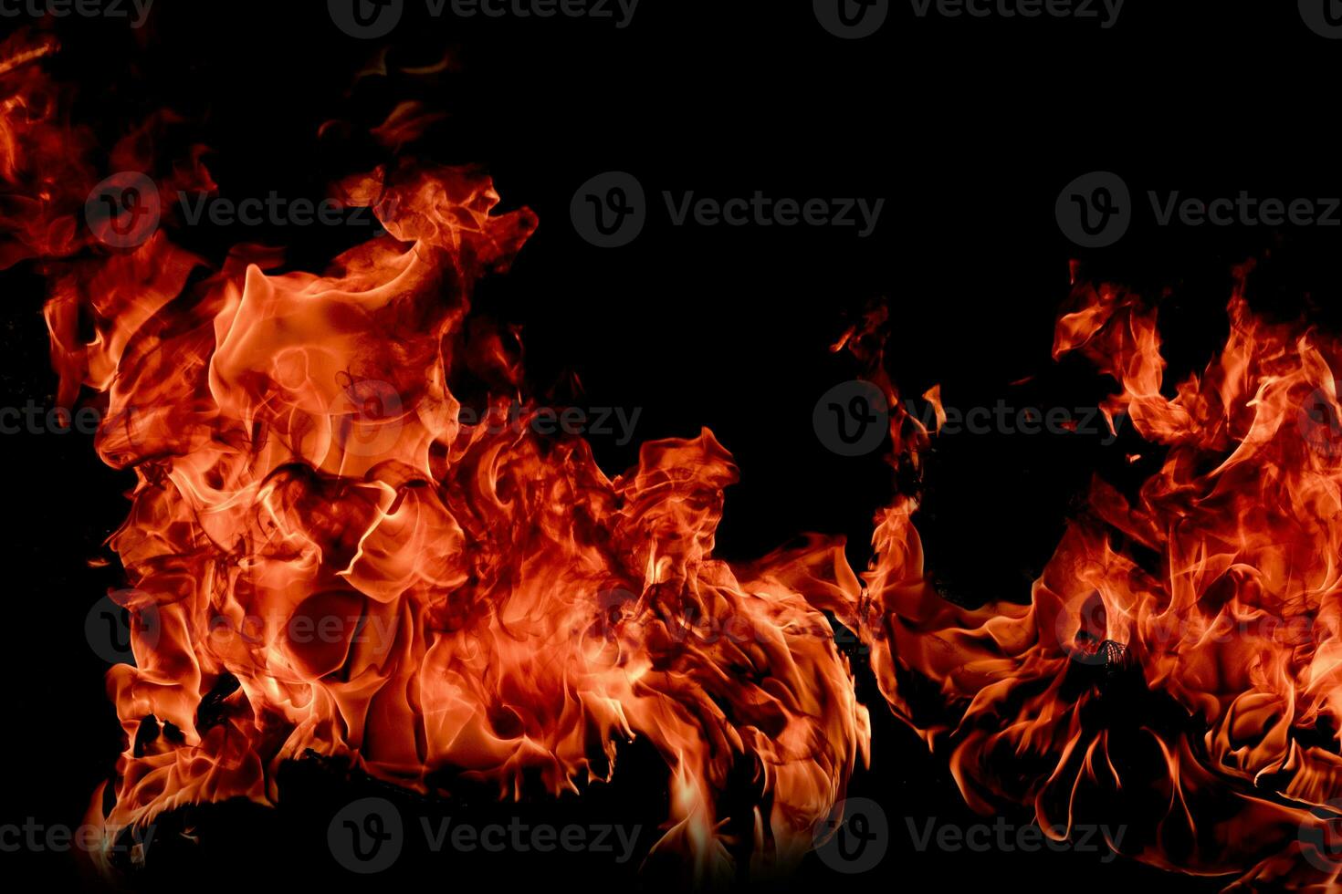 Fire flames with smoke on black background photo