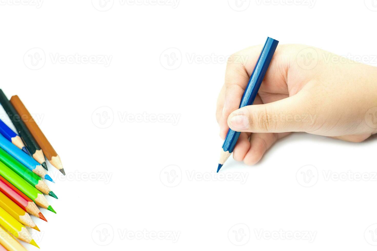 Women hand with pencil by hand on  white  paper at white background photo