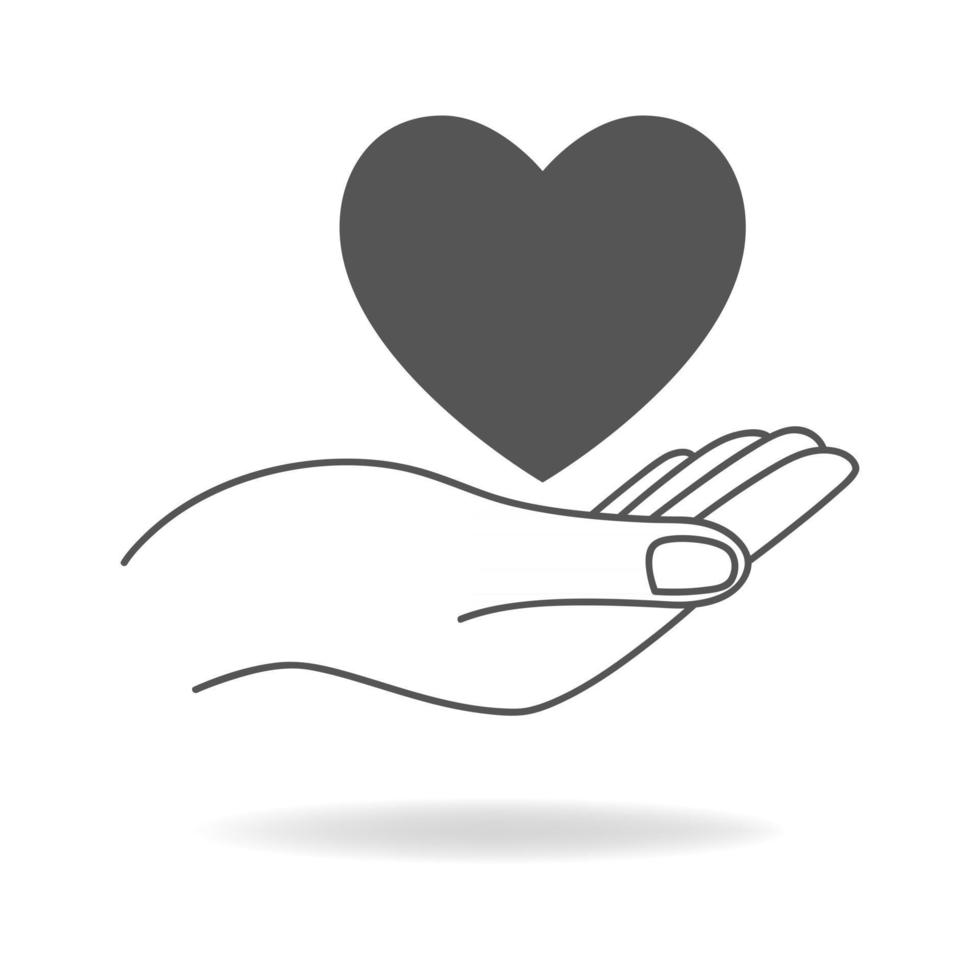 mano sosteniendo un símbolo en forma de corazón vector