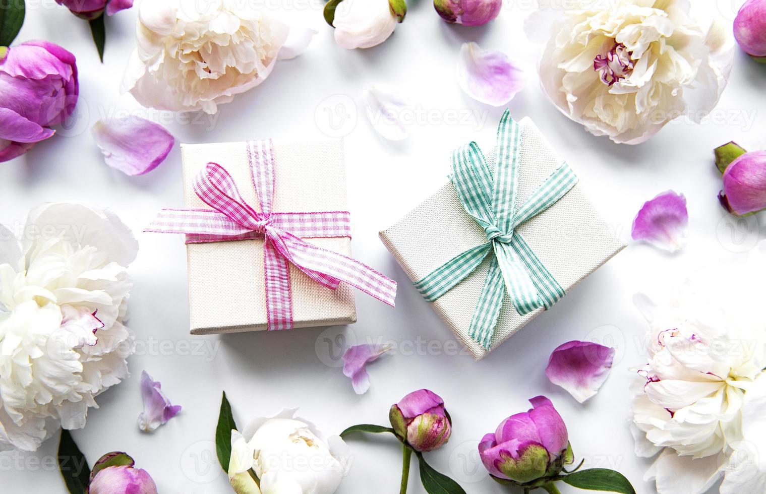 Peonies and gift boxes photo