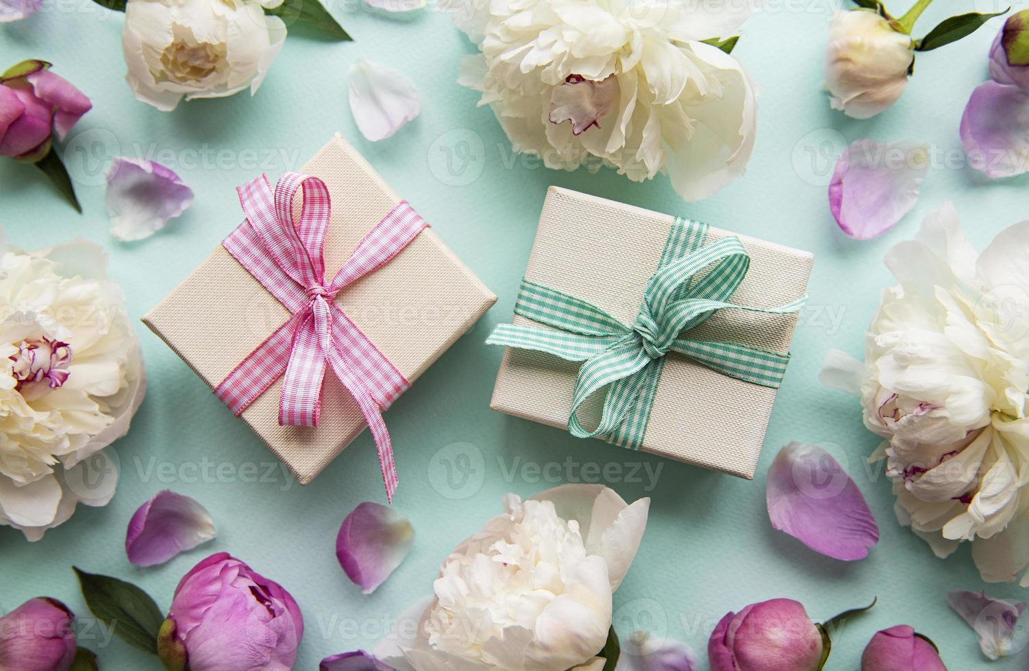 Peonies and gift boxes photo