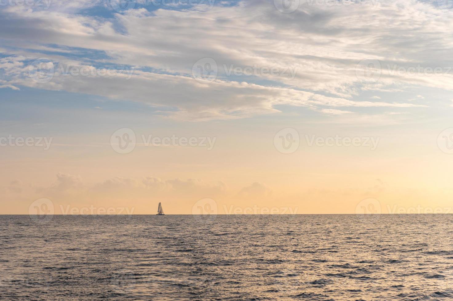 Beautiful light at sunset in the sea in summer. photo