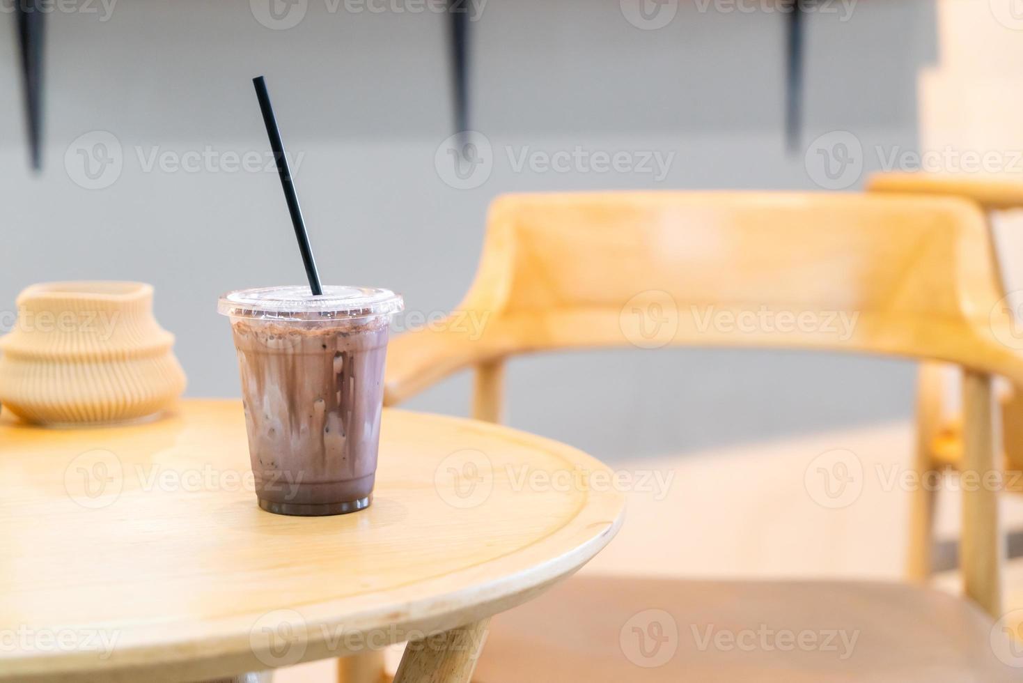 Iced chocolate milkshake in coffee shop cafe photo