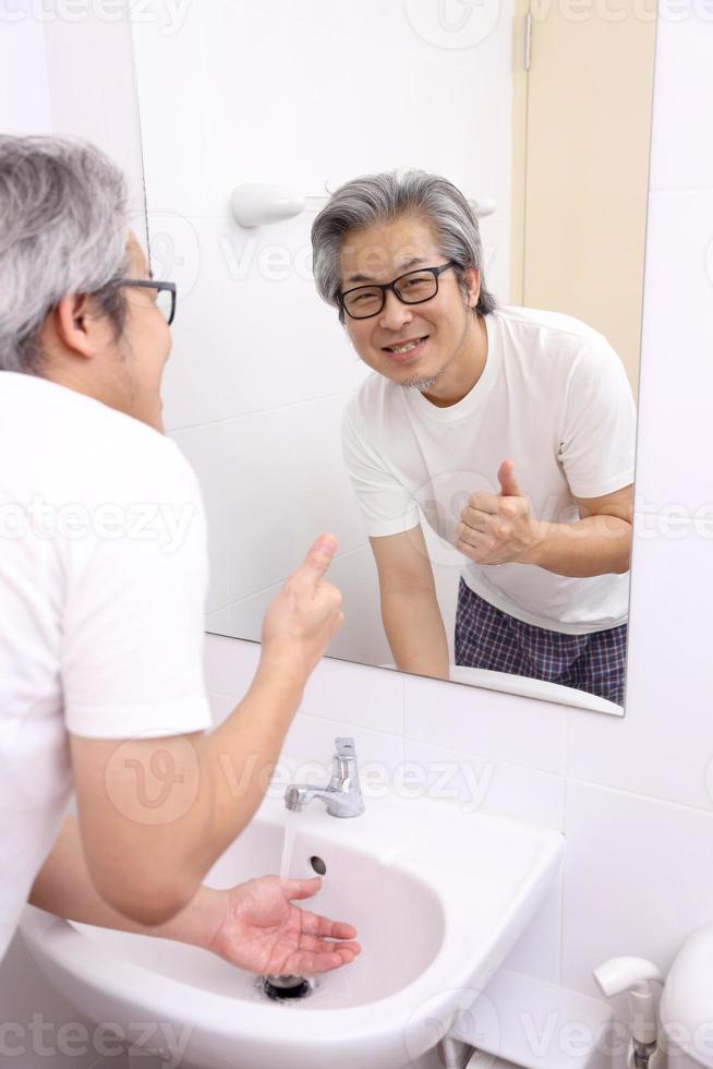 Hand Washing in Washbasin photo