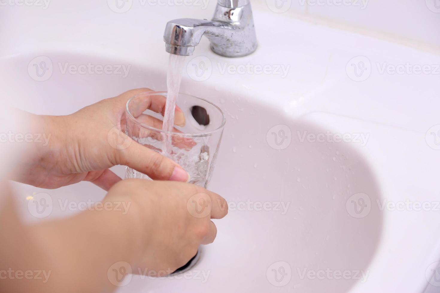 Hand Washing in Washbasin photo