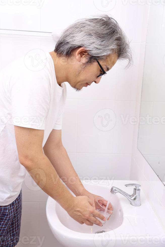 Hand Washing in Washbasin photo