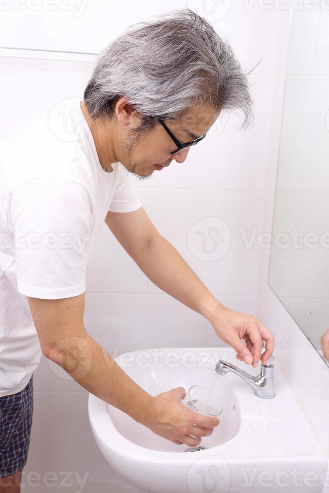 Hand Washing in Washbasin photo