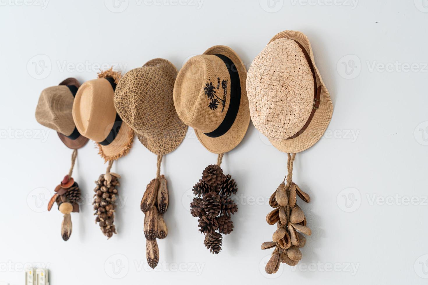 Hat hanging on wall - decoration style photo