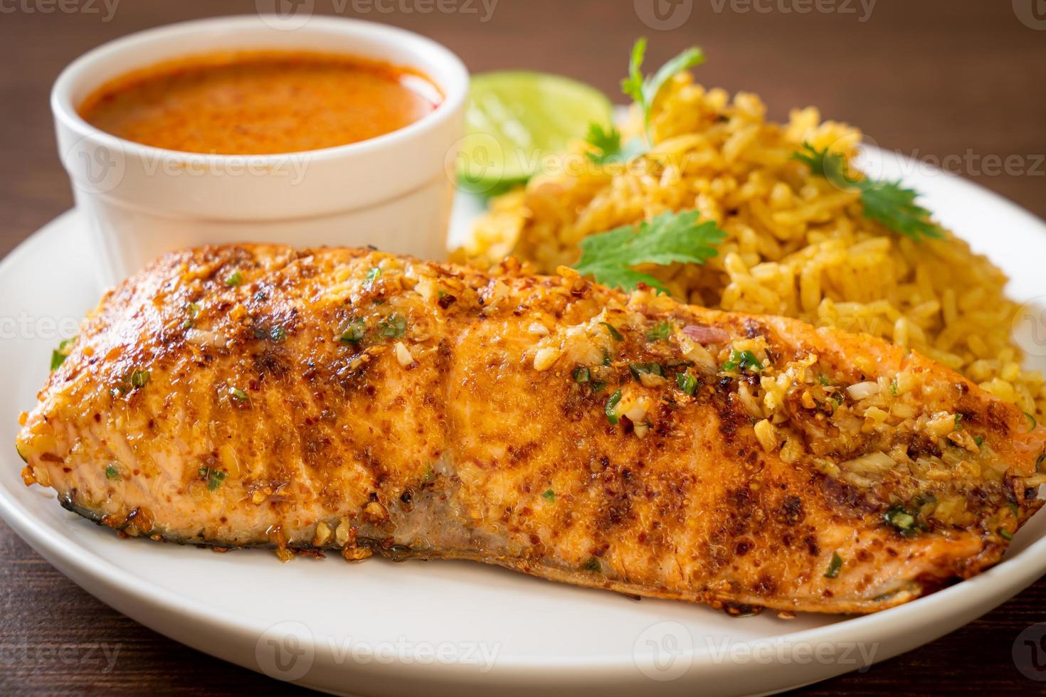 Pan-seared salmon tandoori with masala rice - Muslim food style photo