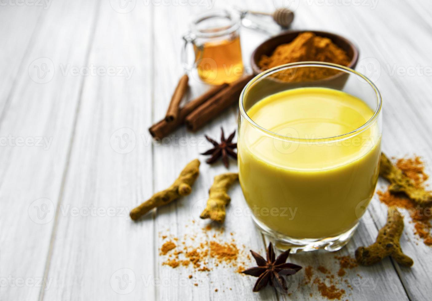 Yellow turmeric latte drink photo