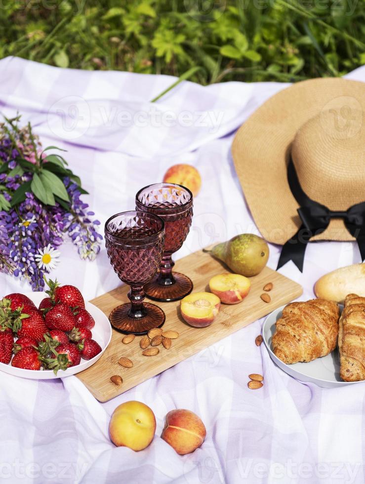 Romantic picnic scene on summer day photo