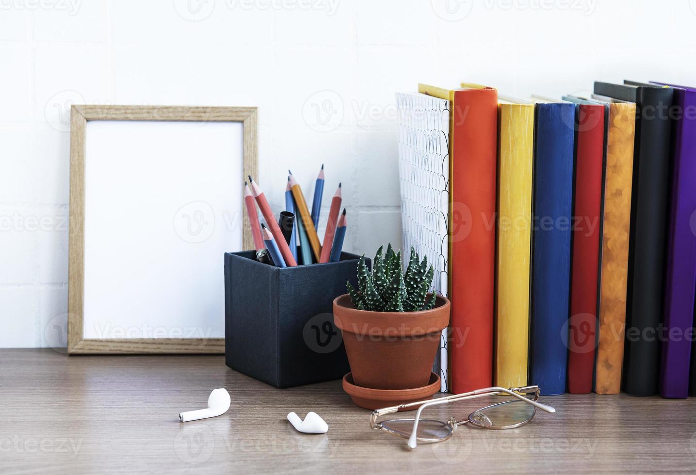 Stack of books on the desktop. photo