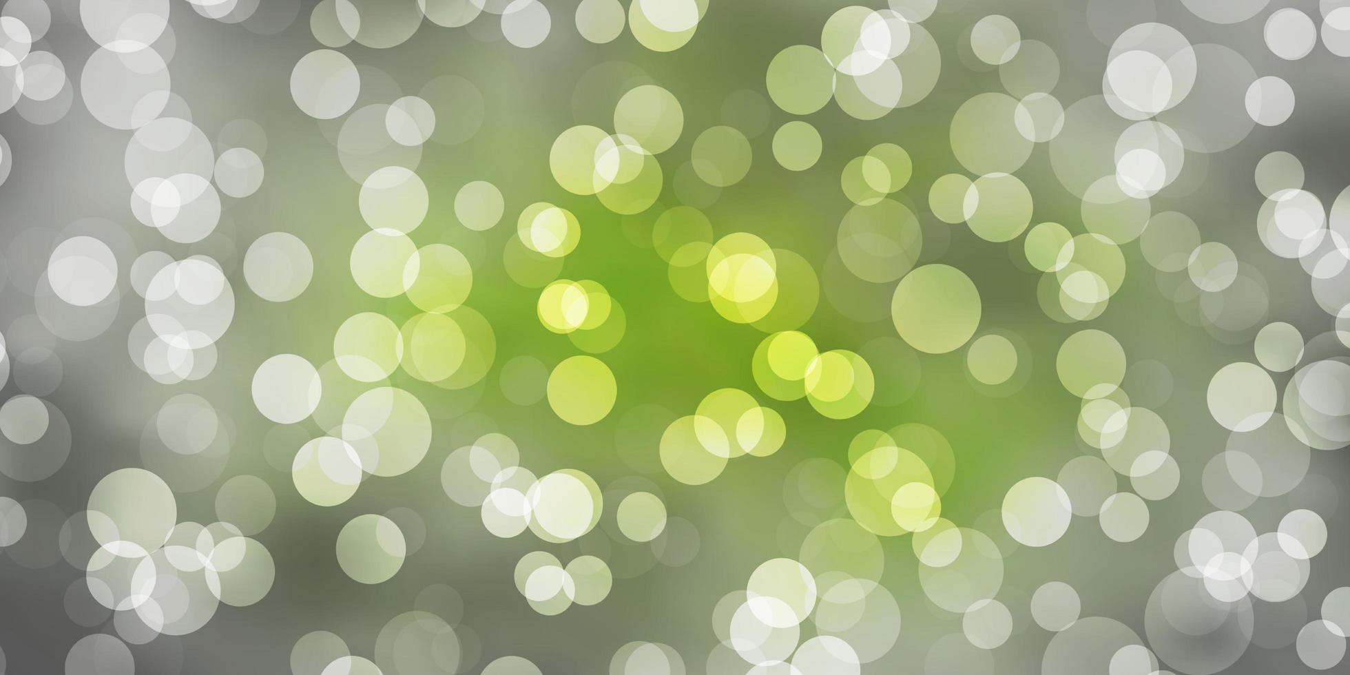 Light Green vector background with bubbles.