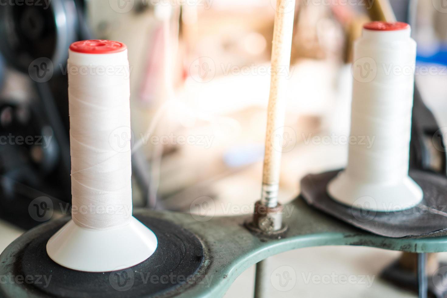 Thread and sewing machine photo