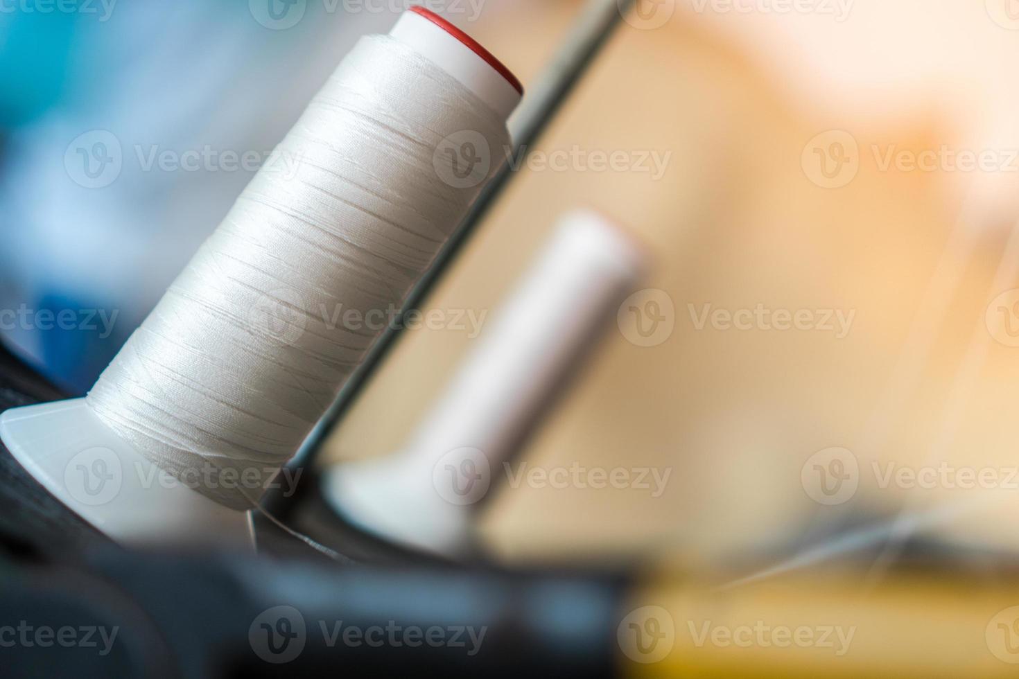 Thread and sewing machine photo