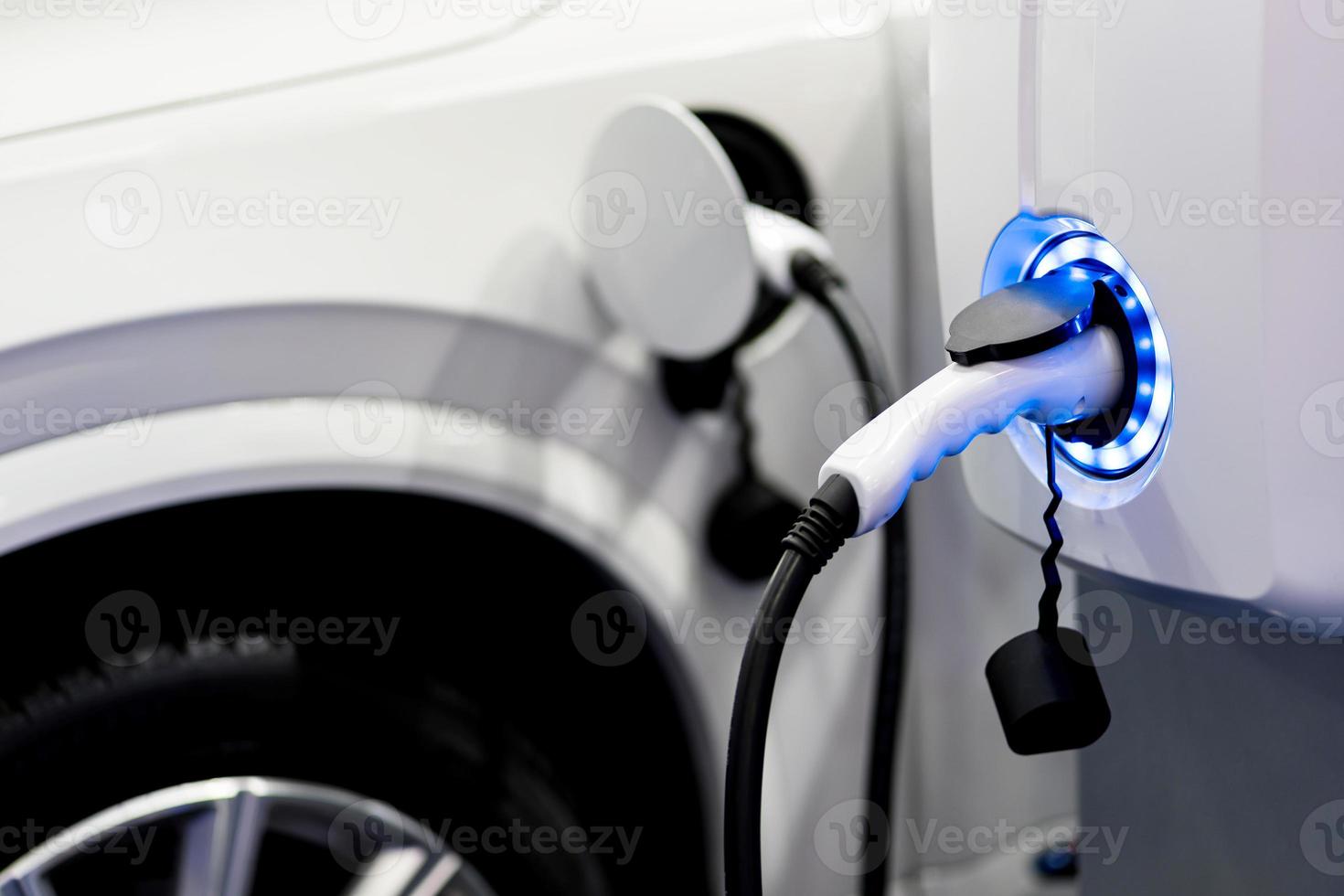 Charging an electric car battery access to vehicle electrification photo