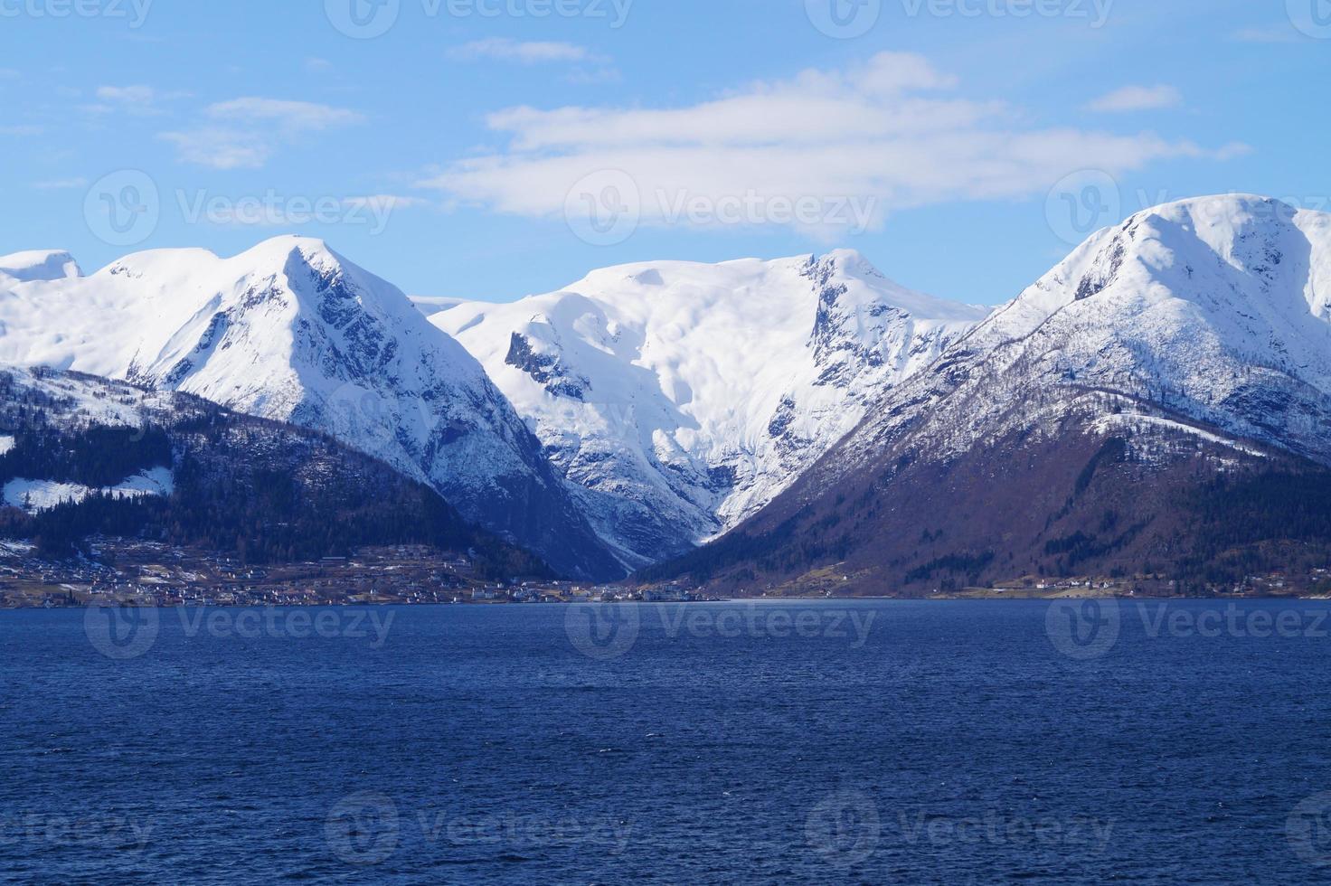 With a cruise ship in the fjords of norway photo