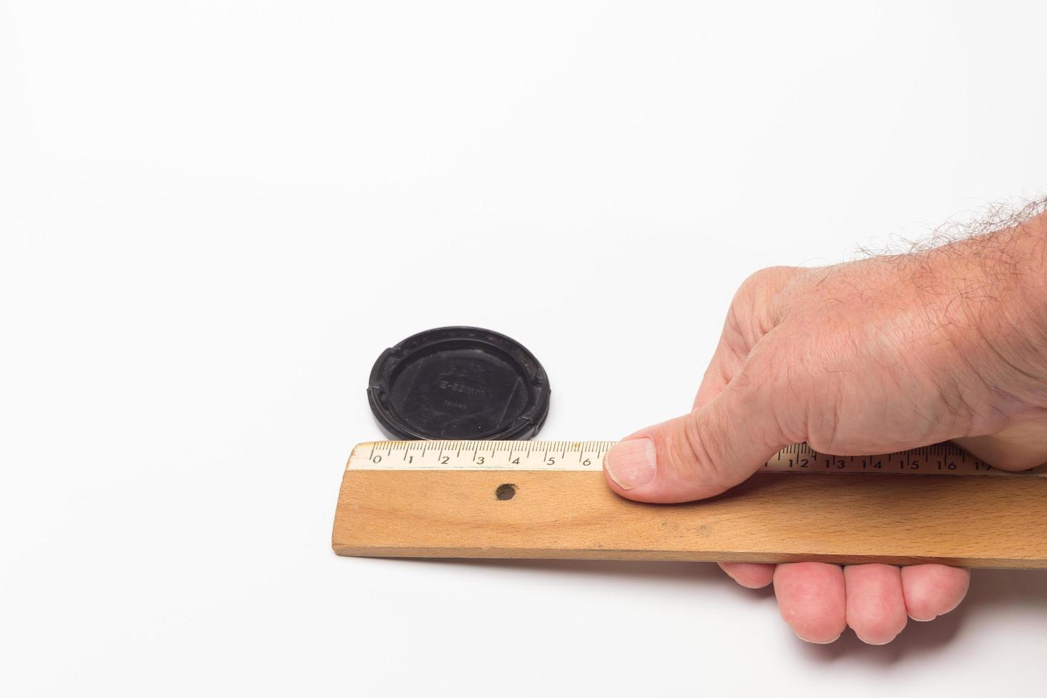 Classic wooden ruler for taking measurements photo
