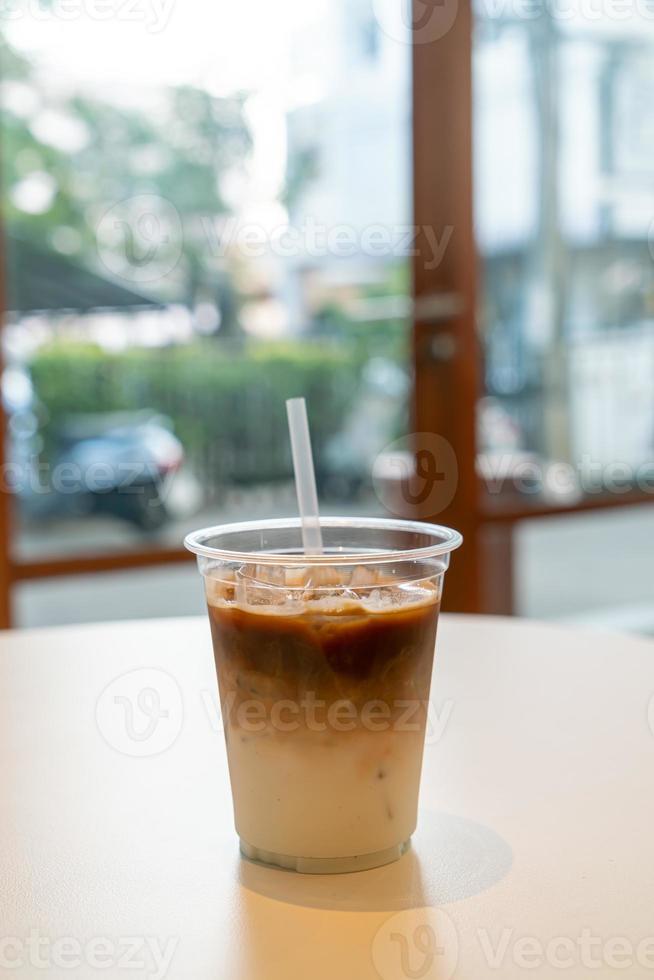 Iced latte coffee cup in cafe restaurant photo