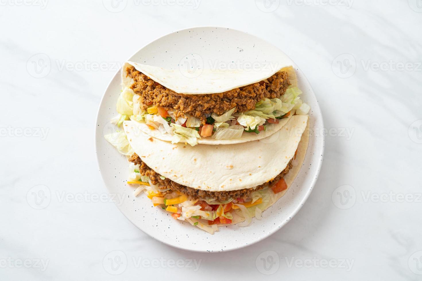 Mexican tacos with minced chicken photo