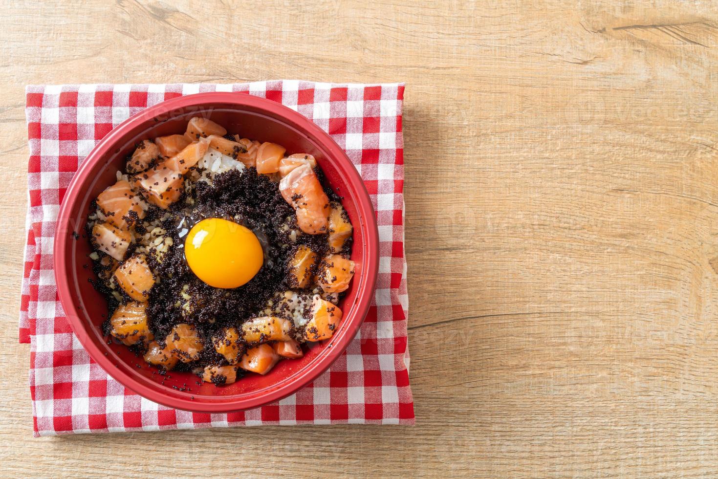 Japanese Rice with Fresh Salmon Raw, Tobiko and Egg - Salmon Don photo