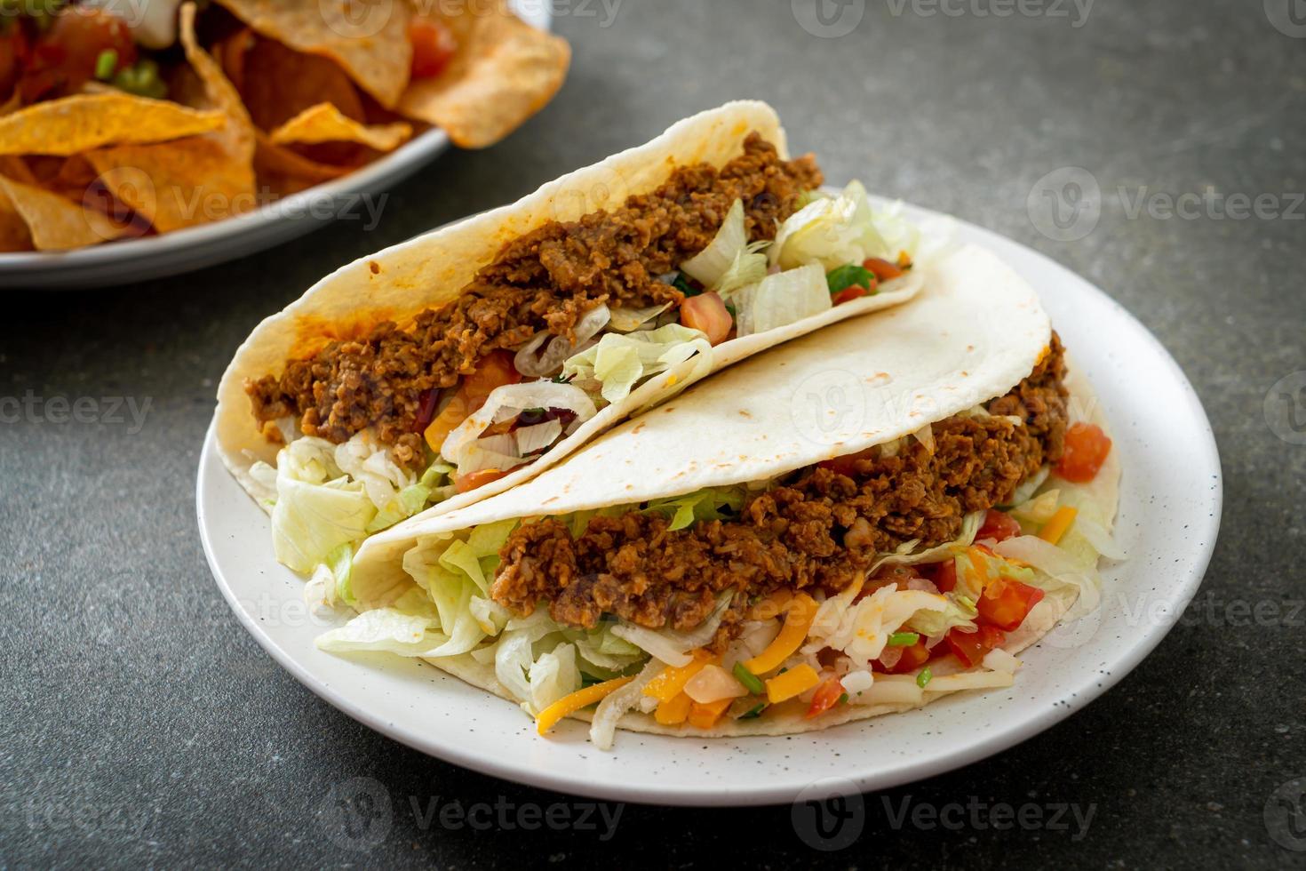 Mexican tacos with minced chicken photo