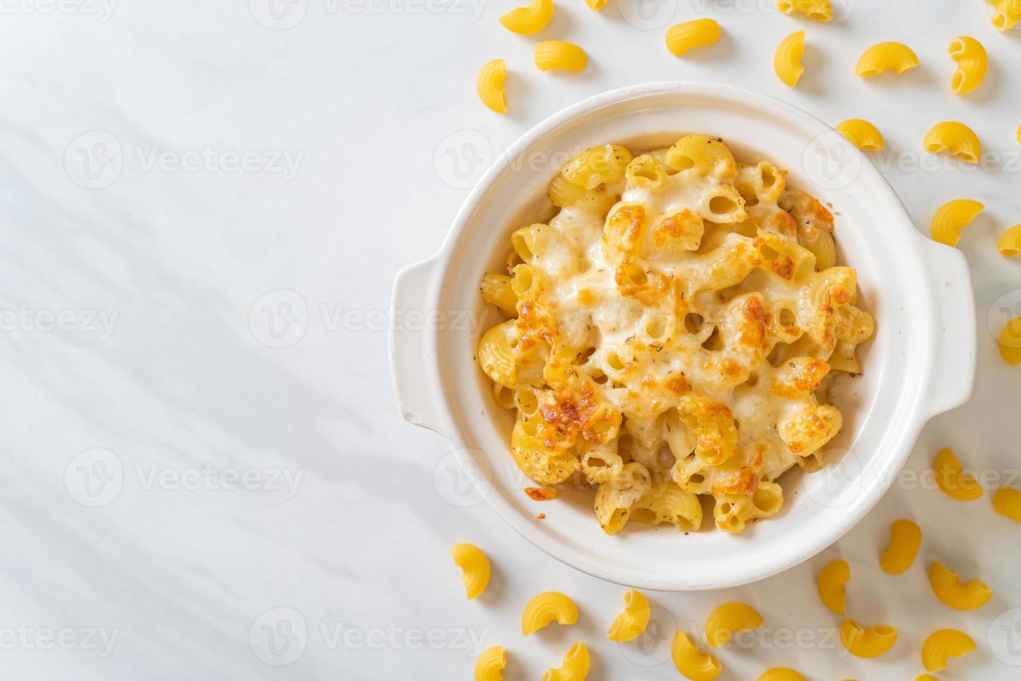 American mac and cheese, macaroni pasta in cheesy sauce photo